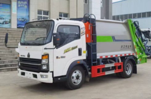 王力压缩垃圾车厂家_5.8方重汽豪沃蓝牌压缩垃圾车价格 王力压缩垃圾车厂家_5.8方重汽豪沃蓝牌压缩垃圾车价格